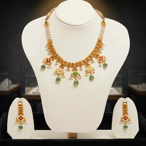Traditional gold temple <b>necklace</b> <b>set</b> with pearl strands green bead drops red stone motifs <b>and</b> matching elegant <b>earrings</b> - Product Image 6