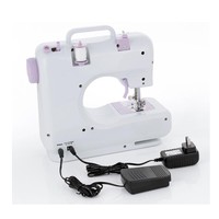 Mini machine à coudre électrique portable pour vêtements