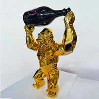 Nouveauté : Statue de gorille King Kong géométrique moderne peinte en or, tenant une bouteille de vin, 40 cm, décoration de table, artisanat en résine