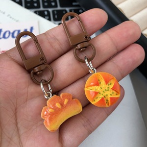 Porte-clés et breloque de sac en résine, réaliste, en forme de desserts 3D (pain, croissant, concha, pain mexicain) et de bougies Farine - Product Image 5