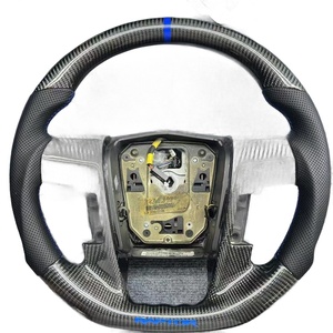 พวงมาลัยคาร์บอนไฟเบอร์พรีเมียมสำหรับฟอร์ด แร็ปเตอร์ F150 อุปกรณ์ตกแต่งแบบกำหนดเอง - Product Image 1