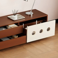 Meuble TV de style Mid-Century, armoire sans poignée à blocs de couleur avec décor rond évidé, tiroirs mixtes et rangement fermé pour appareils multimédias