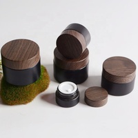 Pot de pots de crème en verre noir givré mat personnalisé de 50g 30g 15g 10g 5g 10ml 20ml 50ml contenants avec couvercles en bambou et grain de bois