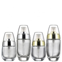Bouteille en verre en forme d'oeuf de luxe 10ml 30ml 50ml pompe givrée transparente crème pour le visage parfum sérum huile essentielle diffuseur d'emballage de luxe
