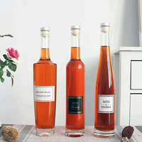 Vente en gros de bouteilles en verre transparentes de différentes tailles pour sauces, miel, cocktails, mélanges, sirops, huile d'olive avec bouchons