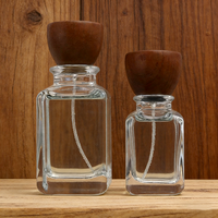 Flacon de parfum carré en verre de haute qualité 50ml 100ml avec bouchon en bois à épaule arrondie, conteneur de parfum vide pour logo cosmétique