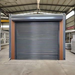 Garage Conteneur Créatif avec Porte à Enroulement Offrant d'Excellentes Propriétés Antivol, Imperméables, Ignifuges et d'Isolation Thermique - Product Image 1