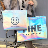 Sacs de shopping non-tissés portables à bandoulière longue avec imprimés animaux laser pour emballage de vêtements féminins stylés