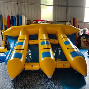 Jogos infláveis de água para lago, jogos de água infláveis muito populares e personalizados, barco de banana e peixes, 2023