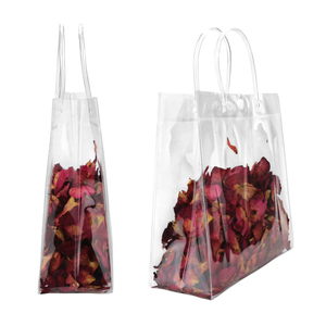 Venta al por mayor personalizado impreso portátil respetuoso con el medio ambiente de vinilo transparente bolsa de <span class=keywords><strong>PVC</strong></span> con asa para dulces Goodie bolsas - Product Image 1