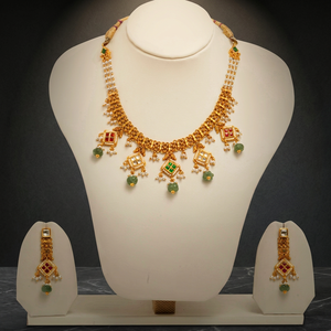 Traditional gold temple <b>necklace</b> <b>set</b> with pearl strands green bead drops red stone motifs <b>and</b> matching elegant <b>earrings</b> - Product Image 5