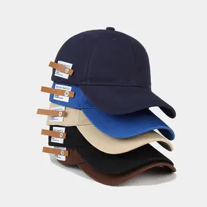 时尚复古英式小皮标签棒球帽男士休闲弧形帽檐棒球帽女士软顶太阳帽