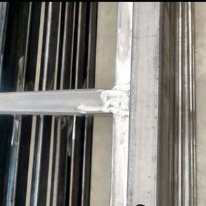 Welded Steel Window Frame Corner Joint Close Up Metal Grille Bars Construction Material Fabrication Detail Industrial Building - Product Image 3