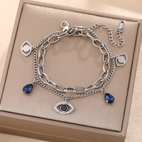 Bracelet en gros Chancy Fashion INS Style plaqué or, chaîne épaisse à double couche, yeux de démon bleus pour unisexe