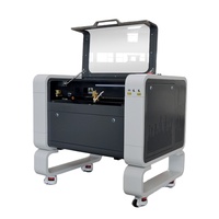 4060 CO2ไม้เครื่องตัดเลเซอร์เครื่องตัดเลเซอร์ Cnc เครื่องตัดเลเซอร์เครื่องแกะสลักแก้วในมณฑลซานตง