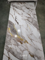 Feuille de marbre en PVC 4*8 pieds 3 mm Noir Or Feuille de marbre UV 1220*2900 mm