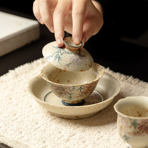 Service à thé Kung Fu en céramique, motif fleur de glycine peinte à la main, finition caramel, comprenant théière, tasses et tasse maîtresse, pour usage domestique, de grande valeur. - Product Image 4