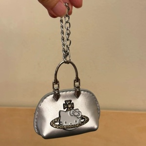 Cute Saturn Cat <b>Leather</b> Mini Chain Bag Charm <b>Keychain</b> with Silk Screen Printing High-end Style Women's Bag Hanger Wholesale - Product Image 2