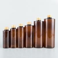 100ml 120ml 150ml 250ml 350ml 500ml Bernsteinfarbene Flachschulter-PET-Toner-Plastikflasche mit Aluminium-Schwarz-Gold-Silber-Schraubverschluss
