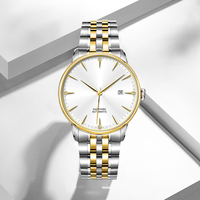 Montre à quartz minimaliste de luxe unisexe avec bracelet en acier inoxydable bicolore, cadran en verre, affichage de la date et fermoir papillon