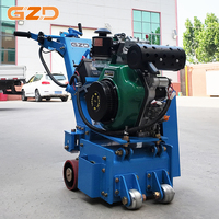 Machine à scarifier le béton à moteur diesel GZD pour l'élimination de la peinture époxy sur les sols d'entrepôts et d'usines