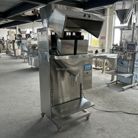 Machine d'emballage semi-automatique à 2 têtes, directement de l'usine, pour bonbons, snacks soufflés, aliments surgelés, céréales