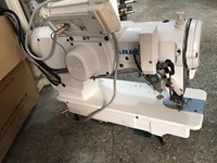 Machine à coudre surjeteuse industrielle d'occasion Jukis 2290-7 pour vêtements