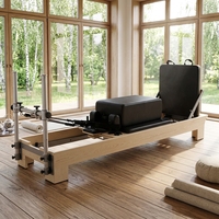 Machine de Pilates Reformer en bois d'érable en gros avec conception de demi-tourneuse semi-élevée pour usage en studio de Pilates