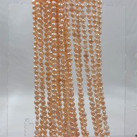 Chaîne de perles baroques d'eau douce naturelles orange 6-7 mm, polies des deux côtés, trou central, fabrication de bijoux, vente en gros