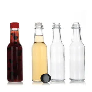 רוטב חם 90 מ""ל 150 מ""ל 250 מ' בקבוקי רוטב זכוכית ריקים עגולים עם פקק פלסטיק, צילום בחום