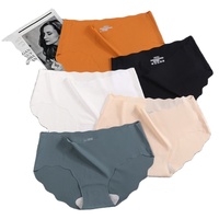 Nouvelle culotte sexy pour femme en soie glacée, dentelle ondulée, taille basse, sans pression, couleur unie
