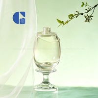 Flacon de parfum vide en verre de luxe 100 ml, design incliné, fond épais, transparent
