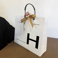 Mode carte blanche femmes sac à provisions 10 pièces stockage de Logo personnalisé gratuit sacs en papier à provisions