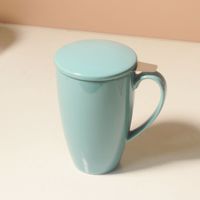 Tasse à thé en céramique de bonne qualité, cadeau d'affaires moderne, ensemble avec couvercle infuseur et soucoupe