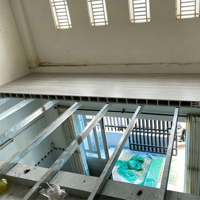 Plaque de revêtement de sol en PVC à grain de bois, résistante à l'usure, pour projets de construction de mezzanines