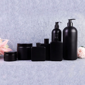 Wholesale Matte Black Skincare Packaging Face Cream Jar Tanning Oil Shampoo Shower Gel Lotion Plastic Pump Bottle Set