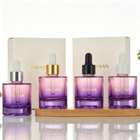 Bouteilles en verre vides pour sérum et huile de soin, à épaule plate, dégradé violet personnalisé, rechargeables, 1oz 2oz 30ml 50ml, avec boîte, fabricant