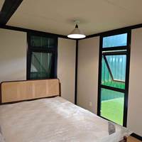 Maison conteneur extensible de luxe de 40 pieds, villa préfabriquée moderne, résistante aux ouragans, en acier galvanisé, maison modulaire pour bureau ou hôtel
