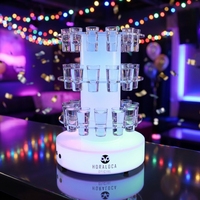 Présentoir rotatif lumineux à LED en acrylique écologique pour verres à shot, idéal pour la publicité