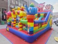 Château gonflable commercial en PVC sur le thème de l'éléphant avec toboggan, combo pour enfants, idéal pour les événements et la location.