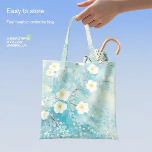 Sombrilla de Lluvia Portátil Ligera con Protección UV, Diseño Diosa del Sol con Pequeño Gancho Dorado y Control Manual - Product Image 5