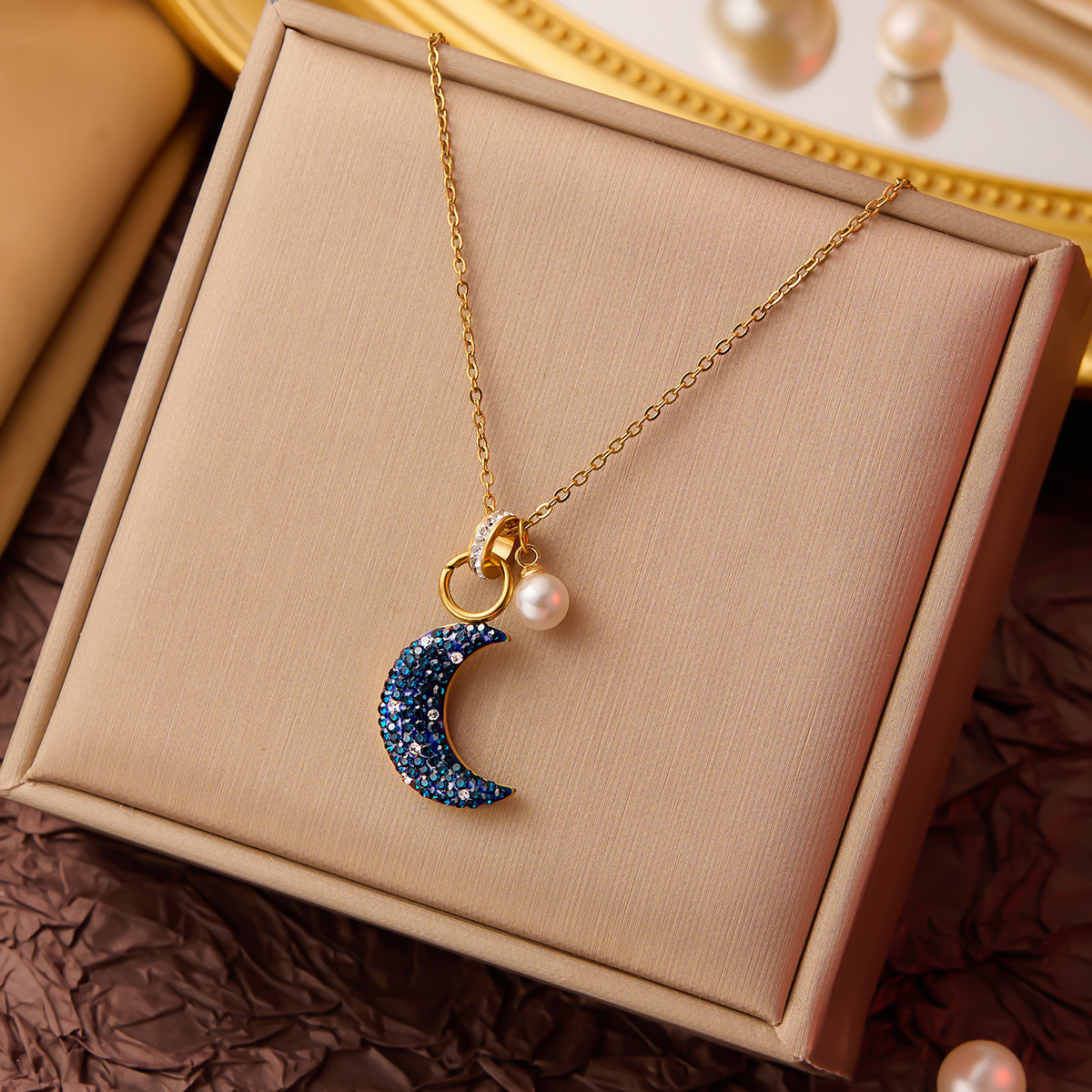 Cerchio di luna blu con diamante e perla