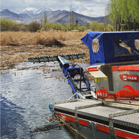 Bateau amphibie pour la coupe de plantes aquatiques, coupe les plantes raciquées de 15 à 25 mm d'épaisseur, protection contre les collisions, moteur/propulseur.