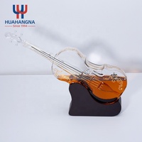 Vente en gros de carafe en verre borosilicate de 1000 ml en forme de violon unique, carafe à vin en forme de guitare creuse pour whisky, scotch et spiritueux