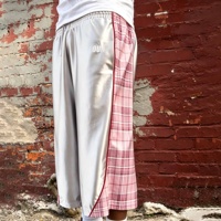 Ouna Clothing Manufacturers - Shorts baggy personnalisés en tissu 100 % polyester, style streetwear hip-hop, avec passepoil, blocs de couleur et patchs à carreaux