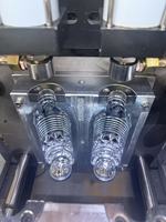 Machine de soufflage de bouteilles PET semi-automatique à deux étapes avec PLC et moteur, haute productivité, haute qualité, directement du fabricant
