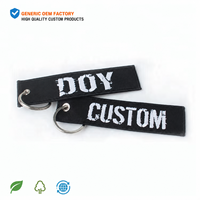 Fabricant de porte-clés en textile tissé personnalisé avec logo brodé à la machine, promotionnel, en sergé, vente en gros à prix abordable