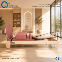 Reformer de Pilates pliable en bois d'érable Rose Poussiéreux avec barre en bois massif et support de rangement pour cours de bien-être en boutique