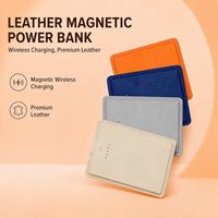 Batterie externe magnétique en cuir mini 10000 mAh, format paume, charge rapide PD20W avec câble intégré, sans fil, vente en gros, logo personnalisé, OEM
