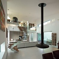 Villa moderne de luxe escalier intérieur en colimaçon en acier finition or escalier incurvé avec lumière LED chaude garde-corps en verre pour appartements